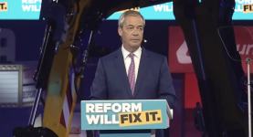 A photo of Nigel Farage at Reform UK's local election campaign rally in Birmingham