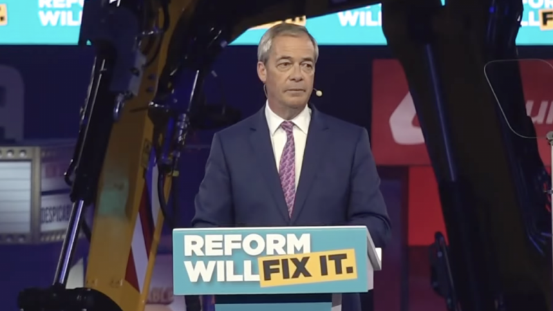 A photo of Nigel Farage at Reform UK's local election campaign rally in Birmingham
