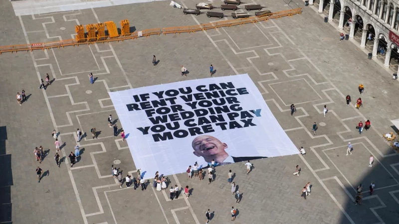 A photo of Everyone Hates Elon and Greenpeace Italy's anti-Bezos poster