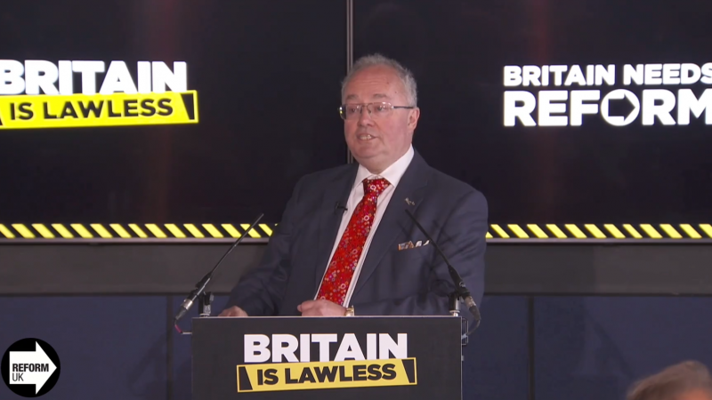 Rupert Matthews speaking at a Reform UK press conference