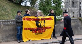 A photo of Fossil Free London activists protesting at Windsor Castle