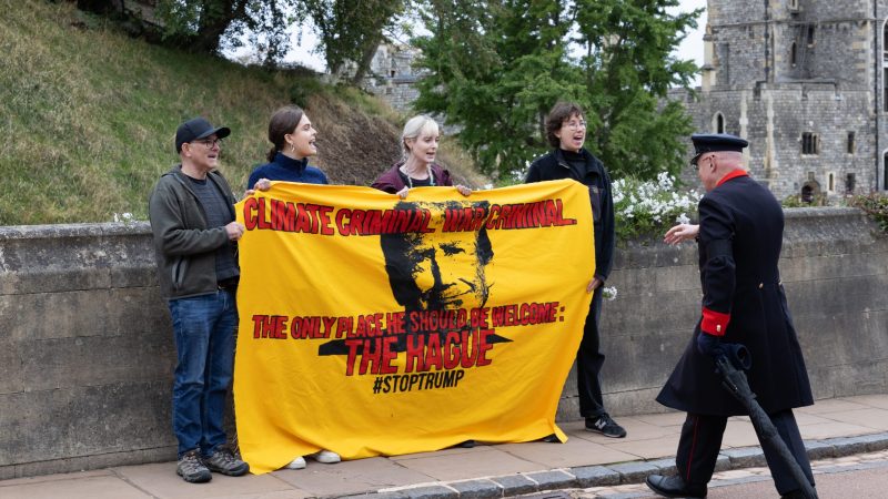 A photo of Fossil Free London activists protesting at Windsor Castle