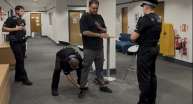 Reform councillor Sam Journet being arrested at Basildon council offices last month
