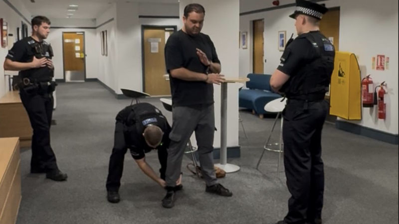 Reform councillor Sam Journet being arrested at Basildon council offices last month